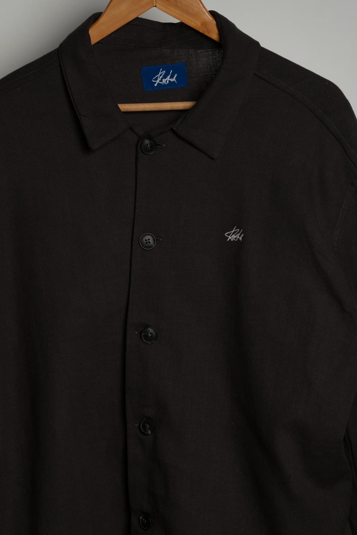 Black Coach Jacket — Collar and label