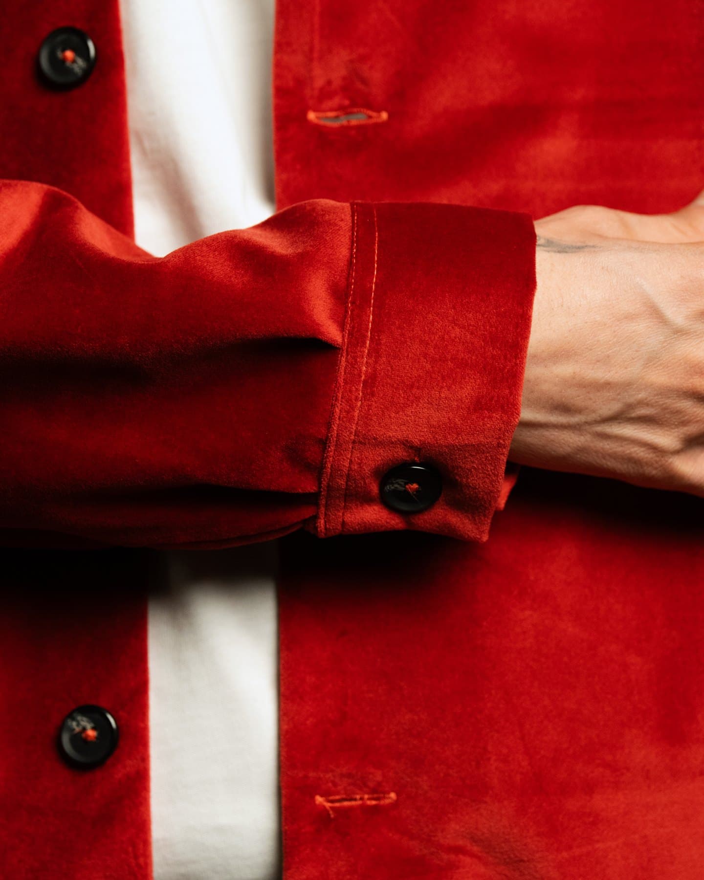Red Coach Jacket — Cuff detail